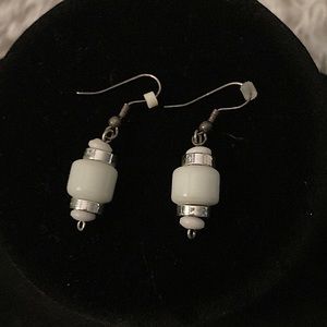 White and silver earrings